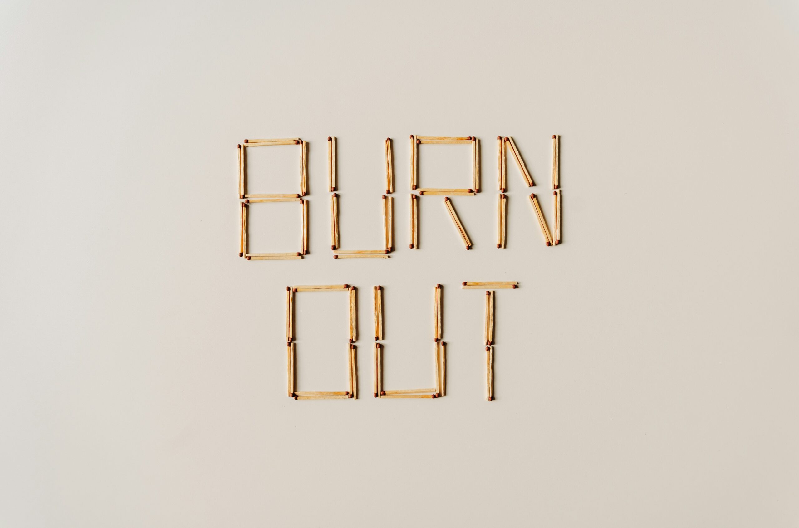 The word burn out spelled with matches
