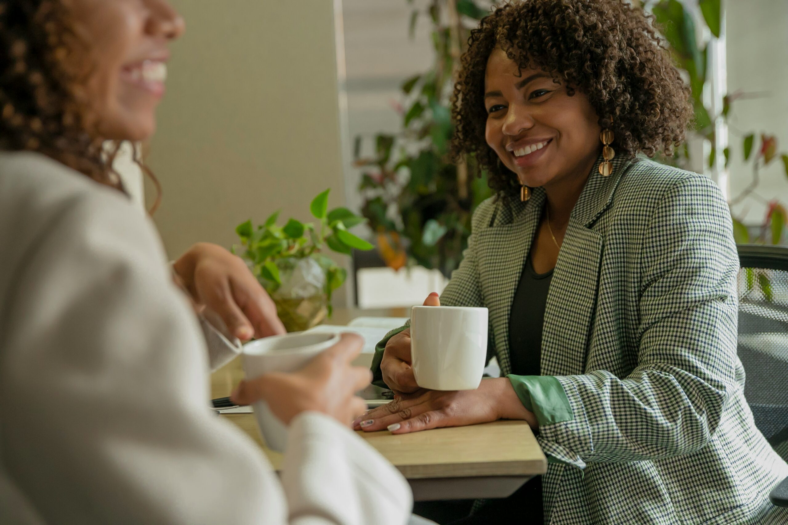 Two business owners having a conversation about why your content isn't converting and how building trust leads to more clients.